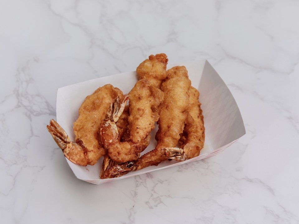 Seafood baskets served with simple sides.